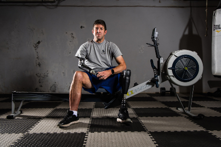 Ryan Kules with his rowing machine