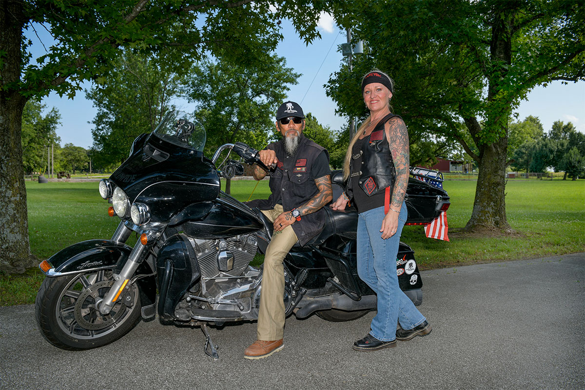 Wounded Warrior Ray Andalio and his wife, Deedra, sitting on a motorcycle.