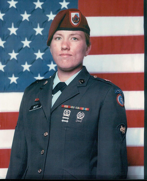 Military headshot of Carola in uniform
