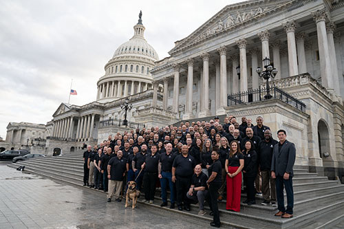 Wounded warriors and WWP employees in from of the U.S. Capitol building.