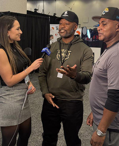 Warriors Nelly Nelson and Joe Lloyd do interviews on Radio Row for Super Bowl LX.