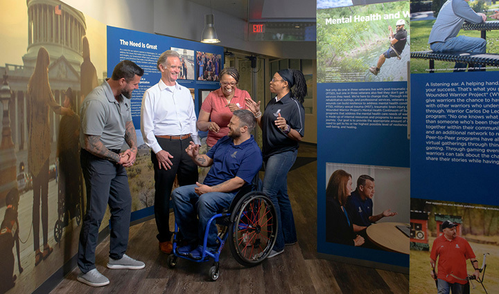 WWP CEO Walt Piatt meets with warriors and teammates at headquarters, highlighting connection and support. 