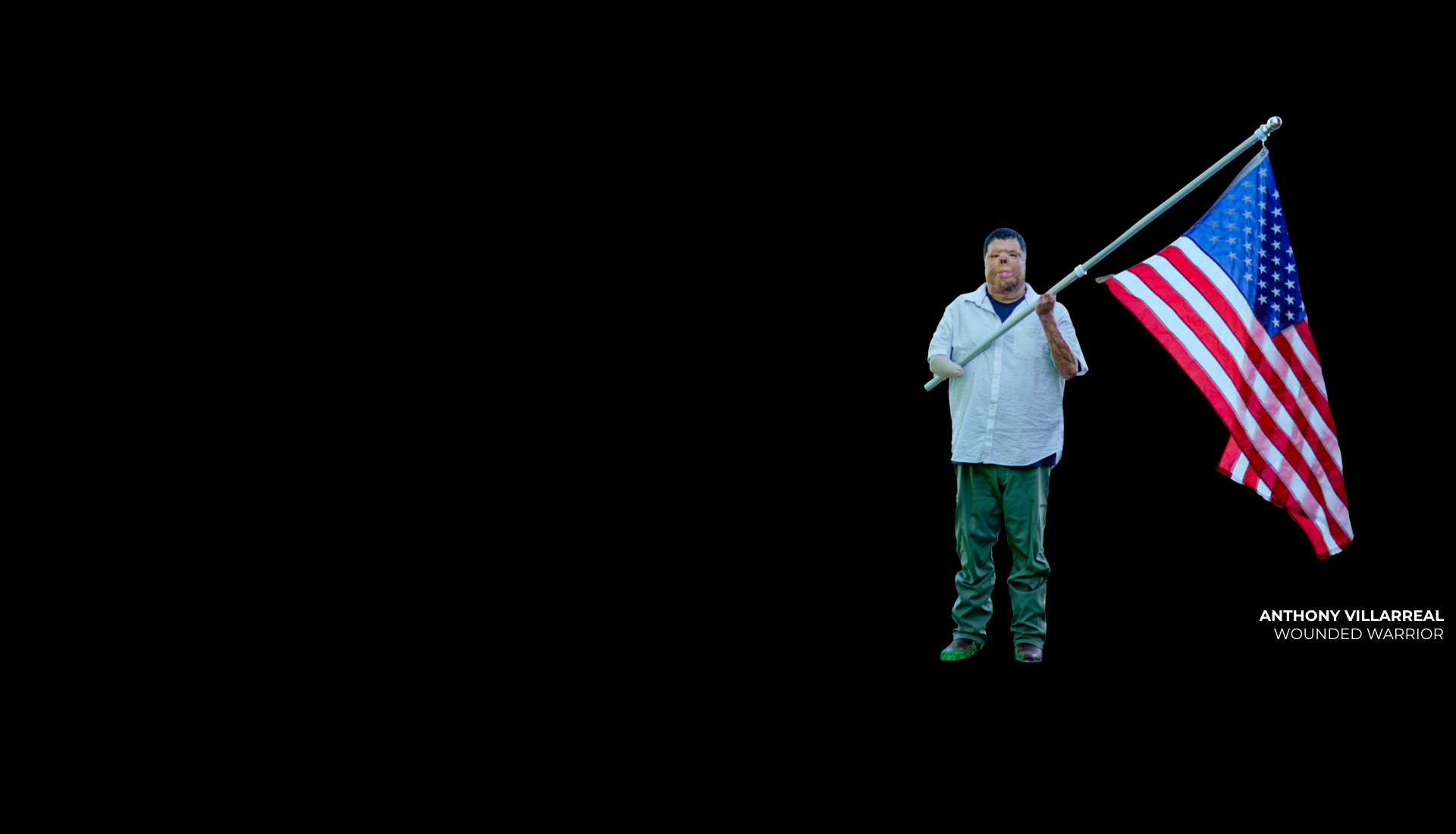 Wounded Warrior Anthony Villarreal Holding A Flag Banner (1)