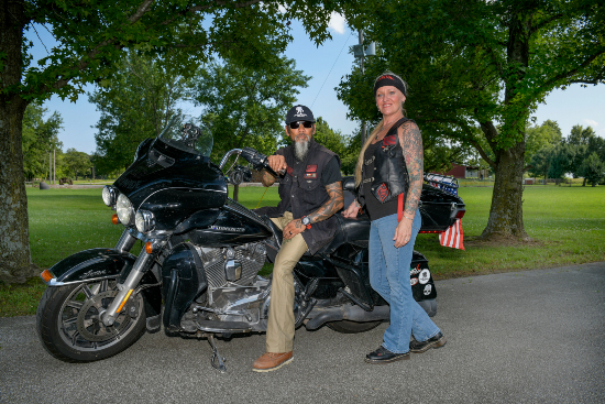 Ray Andalio and his wife on their motorcycle.
