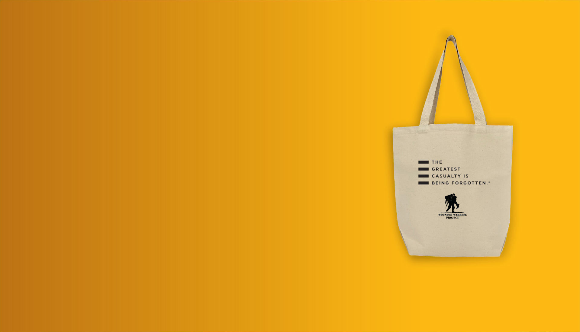A tan canvas tote bag with the WWP logo and tagline “The Greatest Casualty is Being Forgotten” in black text.