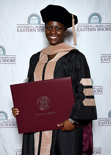 Army veteran and woman warrior Rochelle Cooper graduates with her doctorate degree in 2018.