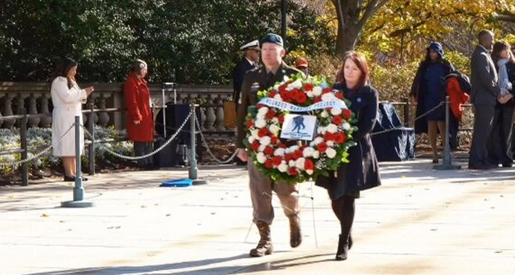 Anna Cherepnina holding a wreath.