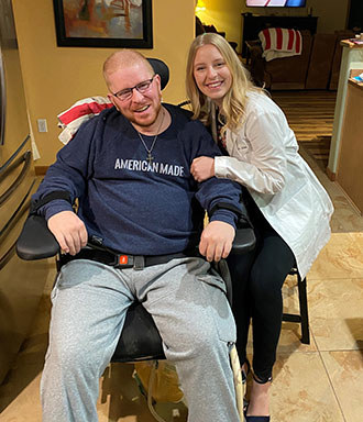 Anneka, who is a nurse, hugs her big brother Erik, who helped inspire her to go into the medical field.