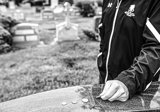 coins on veteran headstones