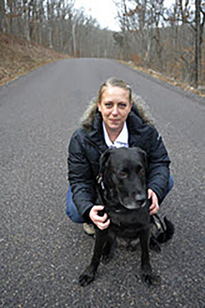 Angie Peacock with her service dog.