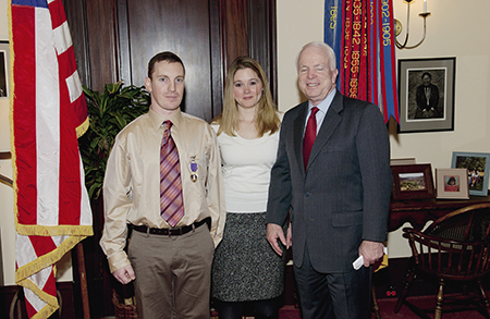 Brian receives the Purple Heart for his service.