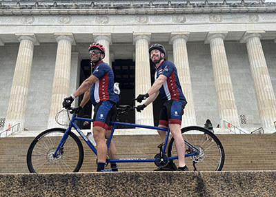 Warrior Zach Tidwell with a Soldier Ride team member in Washington, DC.