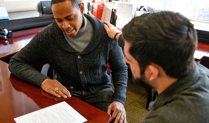 Wounded warrior Tyshawn Jenkins reviews resume with WWP Warriors to Work teammate