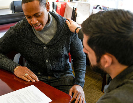 Wounded warrior Tyshawn Jenkins reviews resume with WWP Warriors to Work teammate