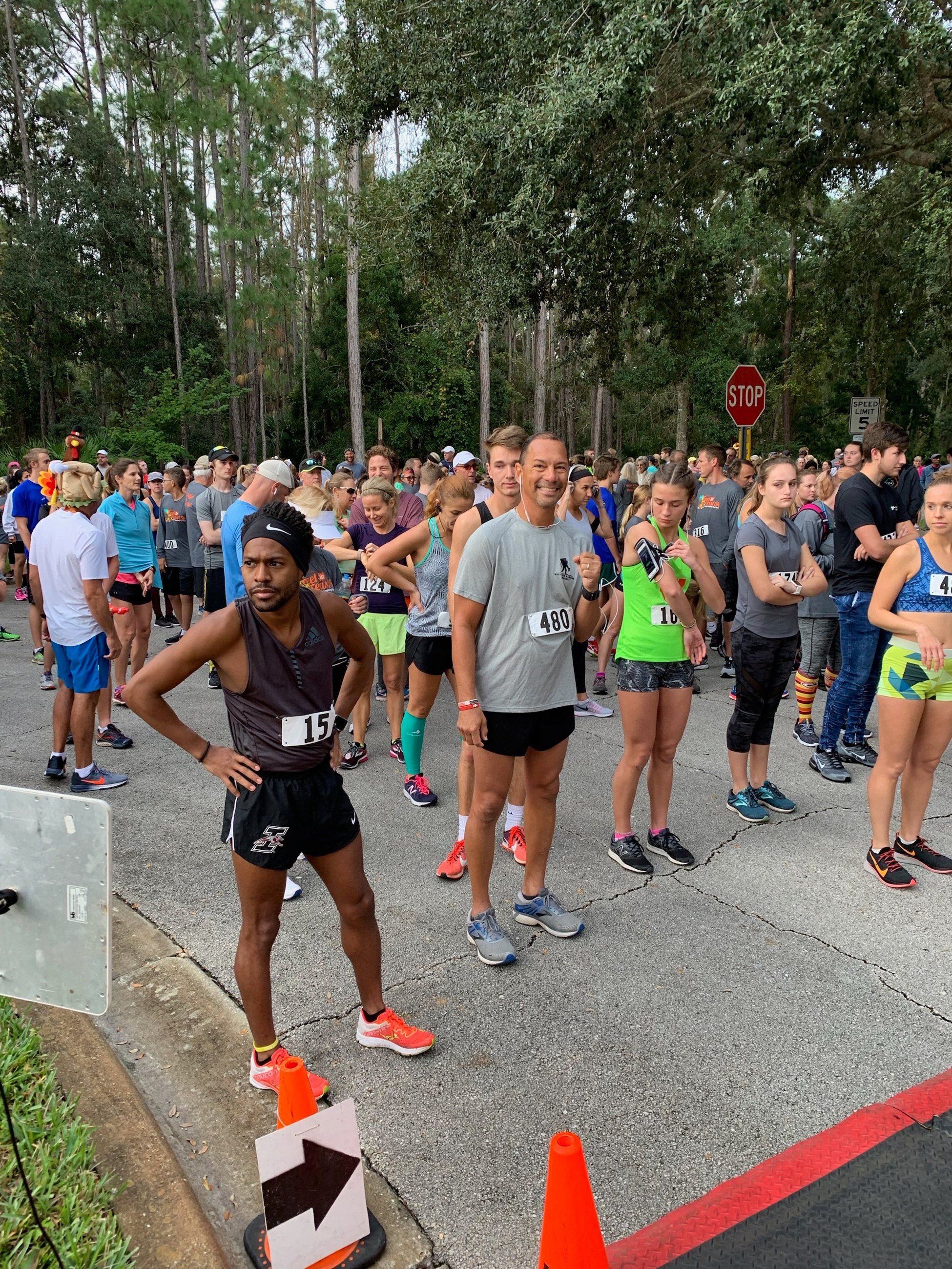 Junior Teron (center) prepares to run in a Thanksgiving 5K run, which was his first goal after the WWP mental health workshop. 
