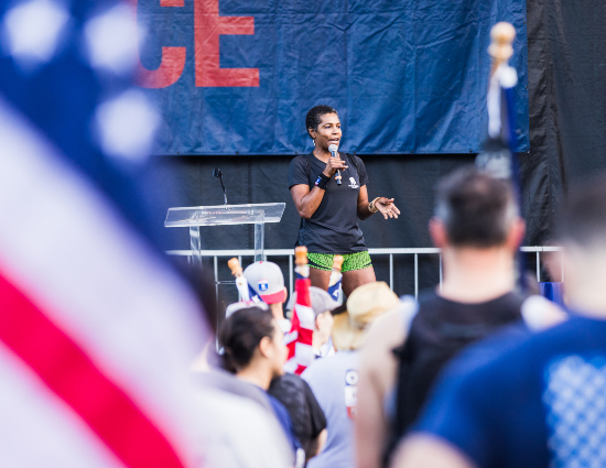 Tonya Oxendine speaks at Carry Forward 5K.