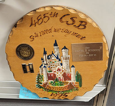 A personalized challenge coin representing the Army's 485th Corps Support Battalion member